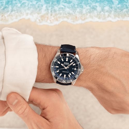 MIDO Ocean Star GMT - Swiss Automatic Watch for Men - 44mm Stainless Steel Case with Black Ceramic Rotating Bezel - Black Dial - Blue Fabric Strap - M0266291705100