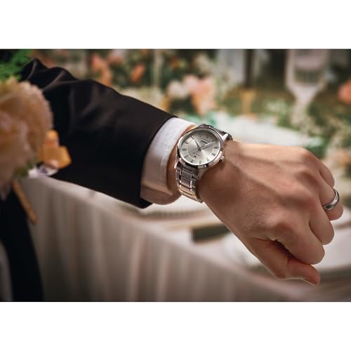 CITIZEN Men's Eco-Drive Dress Classic Watch, Silver-Tone Stainless Steel Bracelet, Ivory Dial, 3 Hand, Day/Date (Model: AW0100-86B)