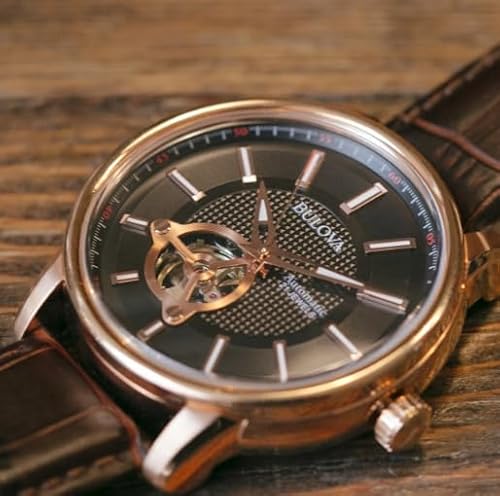 Bulova Men's Classic 3-Hand Automatic Leather Strap Watch, 21-jewels, Hack Feature, Luminous Hands and Markers,Open Aperture and Exhibition Case Back Style: 97A109